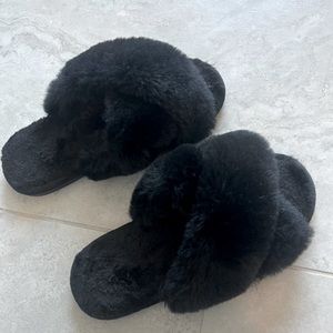Fuzzy black slippers